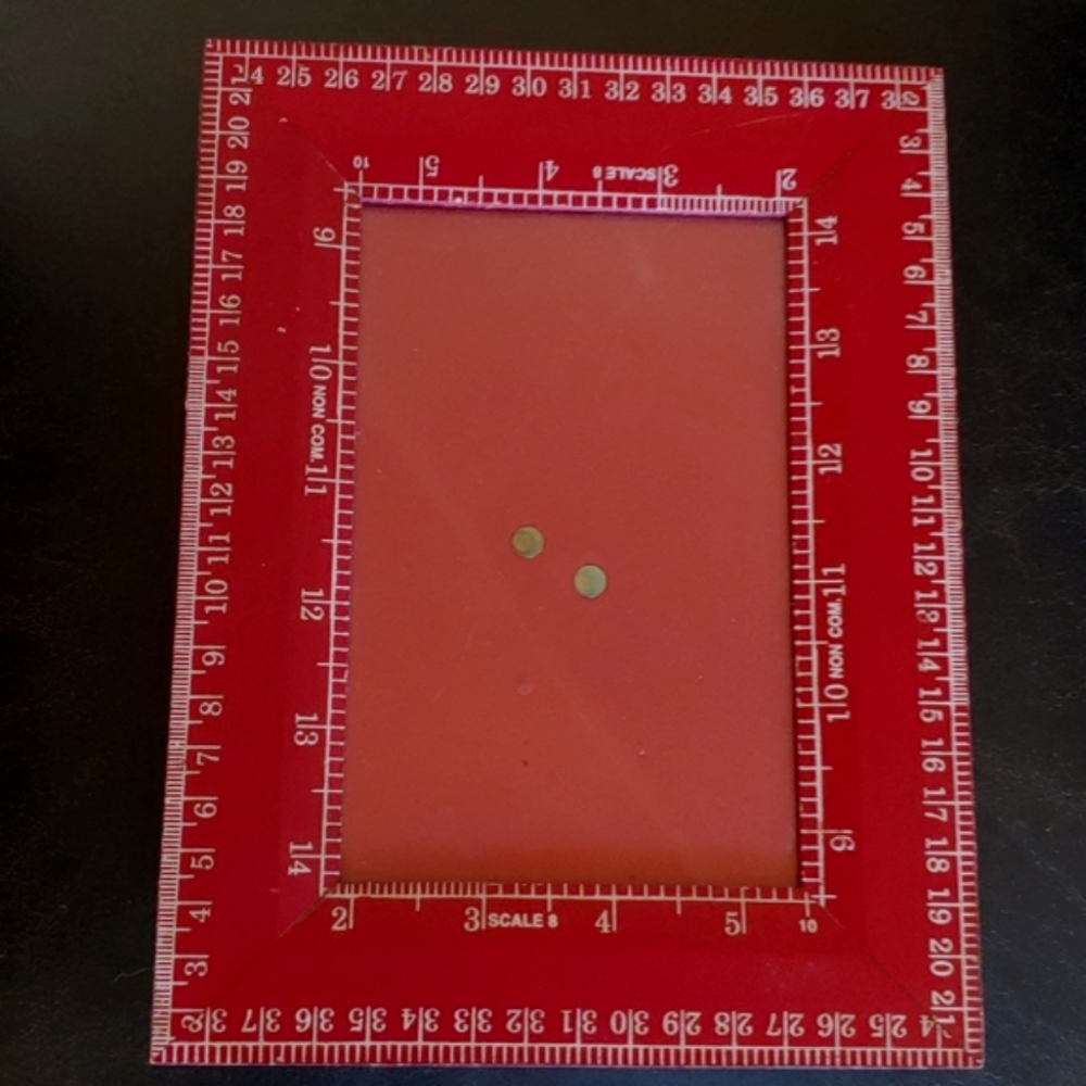 Red picture frame with measurements